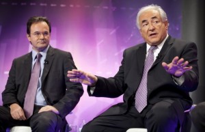Greece's Finance Minister George Papaconstantinou (L) and International Monetary Fund's Managing Director Dominique Strauss-Kahn  World Debate: October 8, 2010 in Washington, DC. 